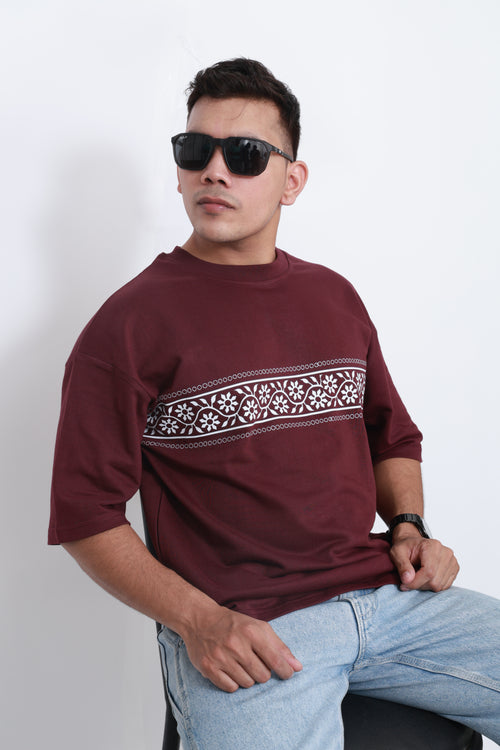 Close-up of Bandhani Boulevard maroon oversized t-shirt – premium cotton heritage bandhani pattern graphic