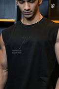 “VILDLIFE Shadow Core black vest for men – plain black gym tank with minimal silicon logo and back monogram.”